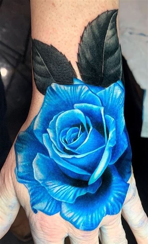 blue rose hand tattoo|More.